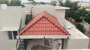 High-quality tile roofing installation on a residential home by Amudha Associates